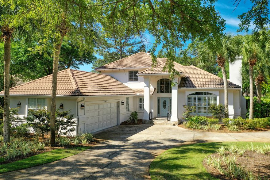 *Stunning and Elegant Coastal Mediterranean Dream Home** Located on a corner lot in the highly desirable neighborhood of Baytowne Circle, this home offers every luxury and convenience for the perfect second home or primary residence. Upon entering the circular driveway, take in the lush landscaping and freshly painted exterior. The oversized two-car garage with a separate golf cart entrance provides plenty of protected parking space. Inside you will enter into a bright and open living space with hardwood flooring, chic lighting, and crown molding throughout the entire home. Entertain your guests in the sun-filled kitchen complete with stainless steel appliances, exquisite granite countertops, and custom finishes.