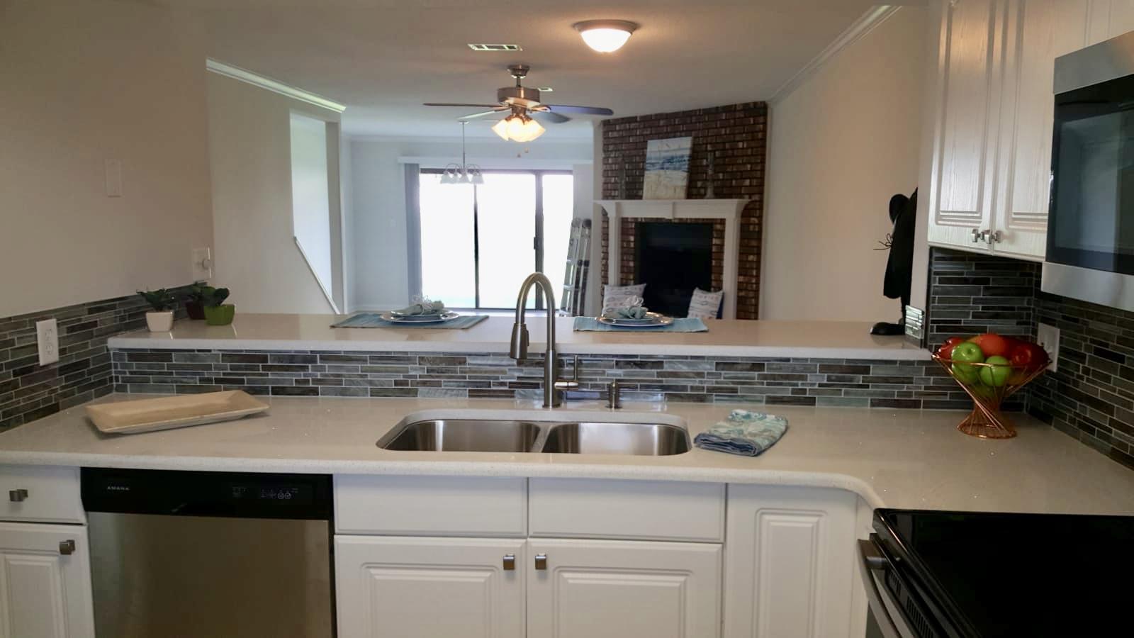 Fantastic remodeled townhome located in the heart of Destin and is priced to sell! Updates include new: high end quartz, paint, tile, stainless appliances, doors, ceiling fans, and light fixtures. This is a bigger unit with a sitting room in master bedroom. Beat the heat this summer with the community pool. Thanks to this townhomes central location, you will be close to everything and just minutes away from schools, restaurants, and the emerald green waters of Destin. Per the HOA, new roof, siding and paint are being paid out of HOA Reserves and there are no special assessments. Please verify with HOA.