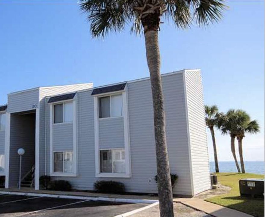 Enjoy amazing panoramic views of Choctawhatchee Bay from your backyard! This 2 bedroom/1bath condominium is only steps from the water, perfect for fishing, snorkeling, kayaking, swimming and more. It has an open floor plan with tile flooring throughout, fresh paint and is a sought after end-unit with ceiling fans in each room. You'll have clear views of the bay from your kitchen, dining and living room! Only minutes from Eglin Air Force Base, Hurlburt Air Force Base, and the white sandy beaches of Destin and Fort Walton Beach.This recently gated Condominium complex features a beautiful in-ground pool, tennis courts, kayak racks and a clubhouse! Combo washer and dryer to convey with the sale. Buyer to verify all dimensions!
