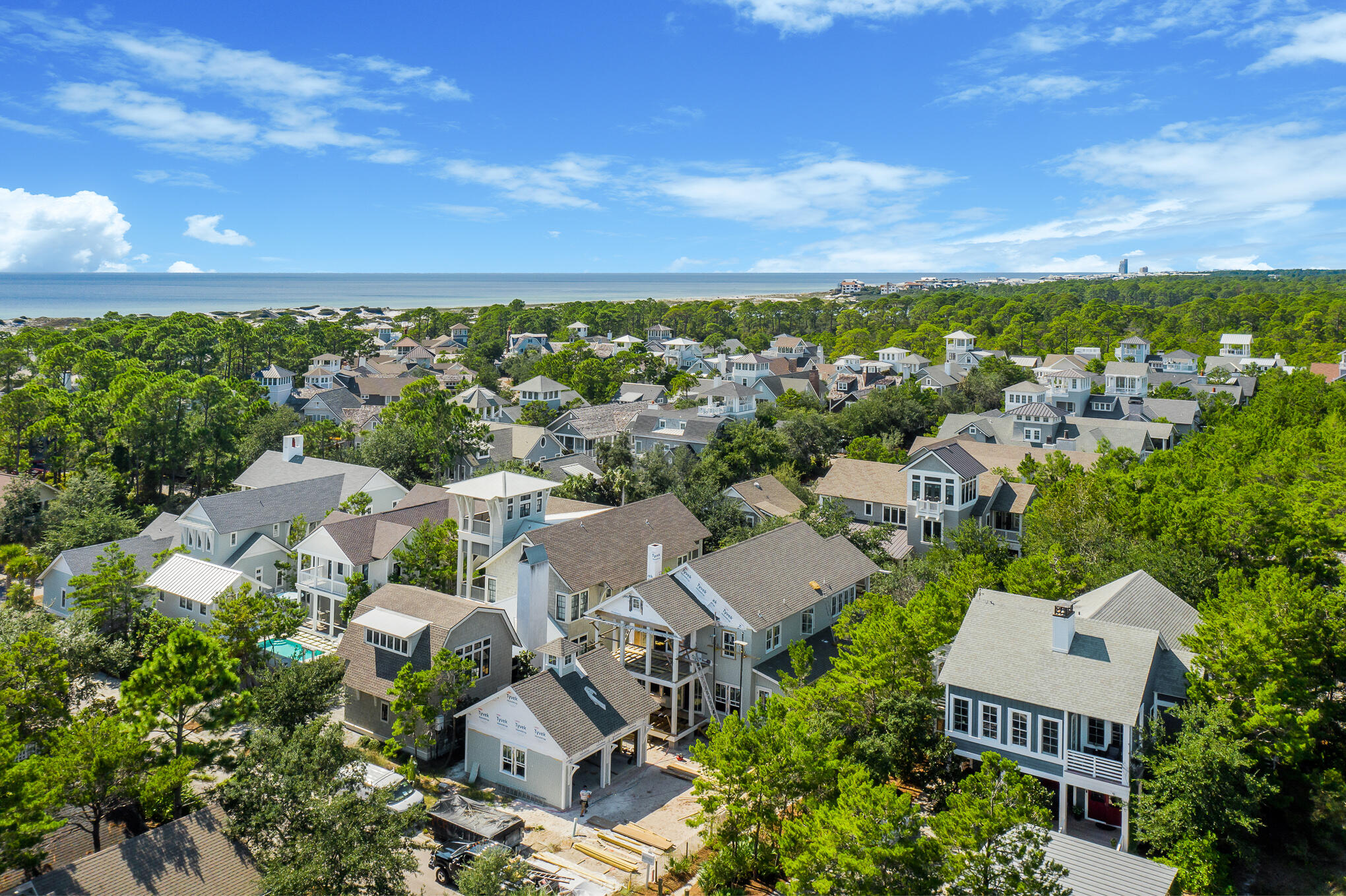 Nestled behind the private gates of WaterSound Beach in the Wind Rose district, this new construction opportunity encompasses over 3,000 square feet of meticulously planned living space designed by the acclaimed team at Allison Ramsey Architects. Upon initial approach, the welcoming front porch leads the way to the grand living area and Chef's kitchen configured with entertaining in mind. The ample outdoor porch space, totaling over 850 square feet, effectively blurs the lines between indoors and out. Synonymous with tranquility and relaxation, the backyard oasis boasts a private pool and outdoor kitchen. A bedroom with ensuite, laundry suite, powder room, and dedicated pool bathroom complete the first floor.