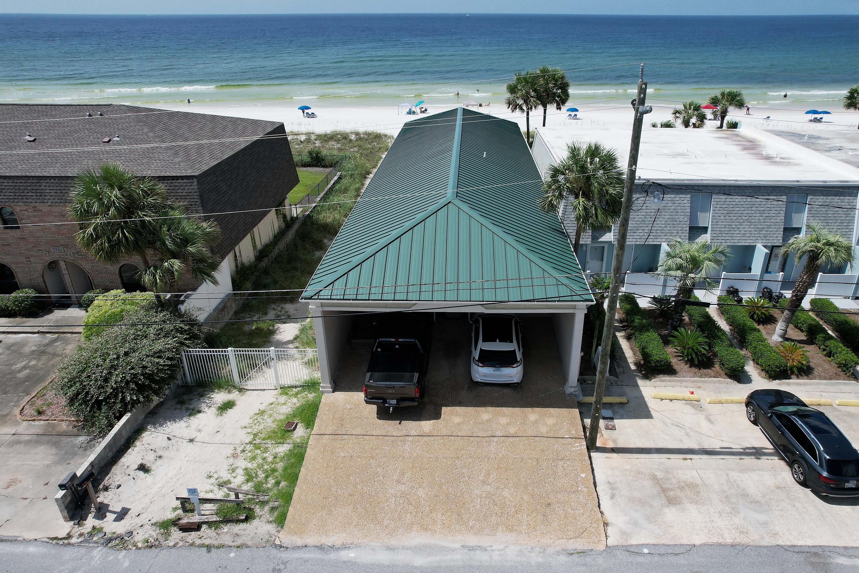 This amazing GULF FRONT retreat offers the ultimate in relaxation and fun! This 5-bedroom, 5.5-bath home offers spacious accommodations for your family and friends and could also be an effective seasonal rental property! The main level includes an enormous Great Room and Kitchen, 2 bedrooms, 2 full baths, a half-bath and a back deck overlooking the Gulf of Mexico! The downstairs features a rec room, a guest bedroom with bath, and two master suites with shared access to the back deck and beach access. Plenty of space for multi-family use and not only is the view spectacular, you're walking/golf cart distance to several restaurants and family-friendly attractions. The home is being sold furnished. All info is approx and must be verified by Buyers if important. Yrly flood ins $8000.