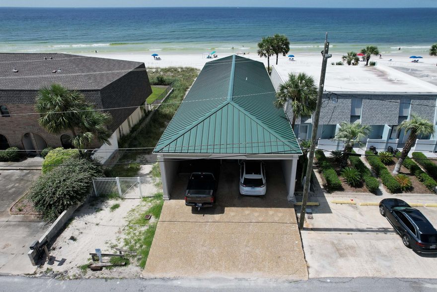 This amazing GULF FRONT retreat offers the ultimate in relaxation and fun! This 5-bedroom, 5.5-bath home offers spacious accommodations for your family and friends and could also be an effective seasonal rental property! The main level includes an enormous Great Room and Kitchen, 2 bedrooms, 2 full baths, a half-bath and a back deck overlooking the Gulf of Mexico! The downstairs features a rec room, a guest bedroom with bath, and two master suites with shared access to the back deck and beach access. Plenty of space for multi-family use and not only is the view spectacular, you're walking/golf cart distance to several restaurants and family-friendly attractions. The home is being sold furnished. All info is approx and must be verified by Buyers if important. Yrly flood ins $8000.