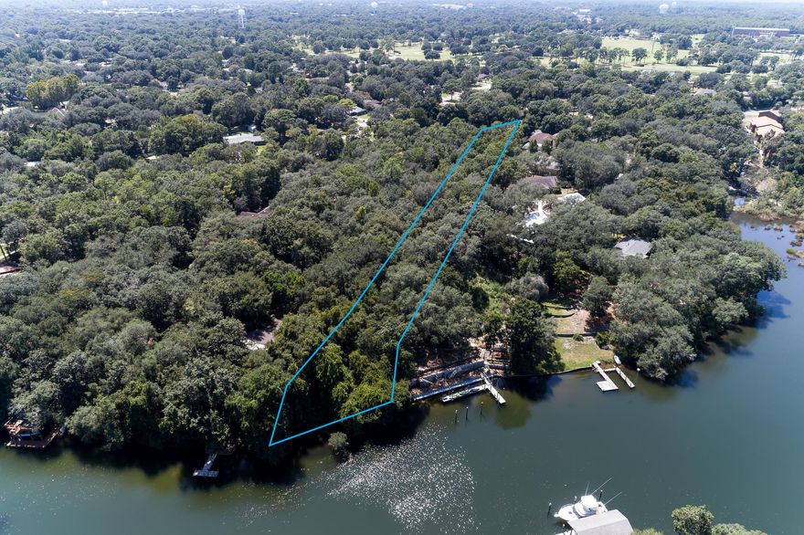 Rare find! Kenwood waterfront - 1.3 acres! This is a beautiful wooded estate lot with over 120 feet of frontage on protected Chula Vista Bayou. Great neighborhood - high elevation - no HOA fees! This is the perfect lot for construction of your dream getaway. Just the right amount of street frontage (+-70') but over 700 feet deep for amazing privacy.