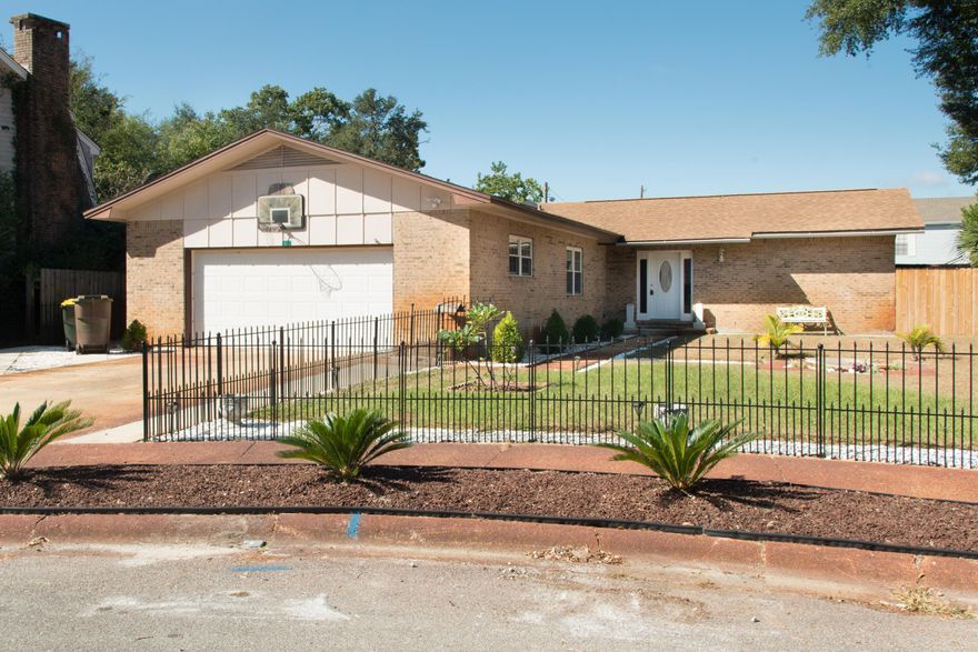 Large home in mid town Fort Walton Beach with an in ground pool on a cul-de-sac. Pool service is provided by owner. Split floor plan for bedrooms with master being separate from others. Ceiling fans in all bedrooms. Family room with wood burning fireplace, formal sitting room and large den. Covered porch overlooking pool area. Galley kitchen. Yard is privacy fenced and has a sprinkler system on city water. Sorry, NO PETS allowed.