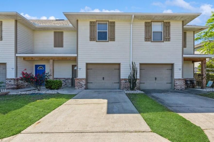 Pool Community and Affordable Living! Spacious 3 bedroom 2.5 bathroom with open concept living, granite countertops, and stainless steel appliances. New refrigerator and dishwasher installed in 2020. New Paint & LVP flooring installed throughout the downstairs level in 2023! Enjoy lots of generous closet space throughout this beautiful townhome. Walk-in closet in the master bedroom. Separate shower, bathtub, double vanity and linen closet in master bathroom.. 1 car garage and 1 car private driveway. No homes are located across the street, providing a view of an open field! Centrally located near downtown Crestview, close to restaurants, shopping, and schools. Enjoy some of the  community amenities at Arbor Lake, to include on-site walking trails, a fish pond, and refreshing salt water pool