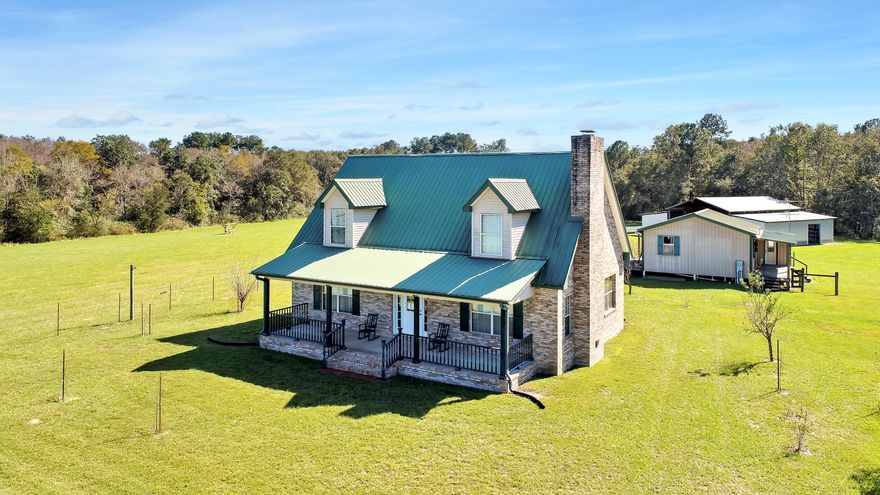 GENTLEMAN'S CATTLE FARM.   This 51 acre farm  with  custom 3 bedroom, 2 bath home was built with great detail, love and compassion for country living.    The custom built home includes wood burning fireplace, open living kitchen & dining area, cathedral ceilings and custom woodwork through out.   Strength, safety and efficiency was the goal when seller used  2x6's with 16'' centers with brick outer walls. Out buildings include a classic cabin with kitchen & bath ( perfect guest house or man cave), 12x20 workshop, 60x64 metal barn,  pig pen designed to raise up to 20 hogs and a chicken coop.  The property is fenced and cross fenced with two pastures and water run to each pasture.  Property includes 65 blueberry bushes, peach, apple and nectarine tree with irrigation to all.  Shown  by appt.