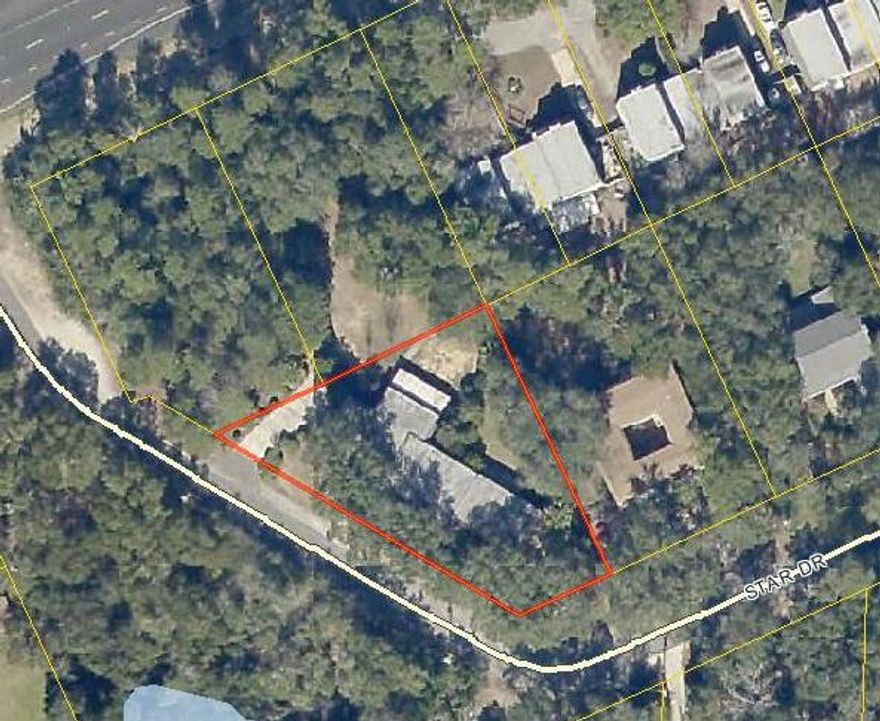 2,700 square foot Duplex on .41 Acres zoned mixed use. Two adjoining parcels, totaling .74 acres, are also available to be purchased. The duplex is currently 100% occupied with long term tenants on month to month leases.