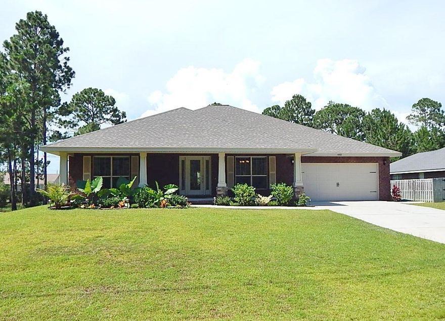 Beautiful ALL BRICK move in ready home with 5 Bedrooms, 3 full baths in country club style living area of Holley by the Sea! Absolutely stunning interior with ALL the upgrades, ss appliances, smooth cooktop, ALL granite, PVC waterproof laminate flooring, fresh paint. Huge master closet and master bath with garden tub and 5 foot separate shower with granite countertops. LIKE NEW! Oversized bedrooms! Irrigation system including sprinklers on almost a half acre of land!! Wonderful location, neighborhood recreation clubhouse with tons of amenities including swimming pools and less than 15 minutes to the BEACH! Split, open floor plan all on one level, This house has it ALL, don't miss out!! Easy to show!