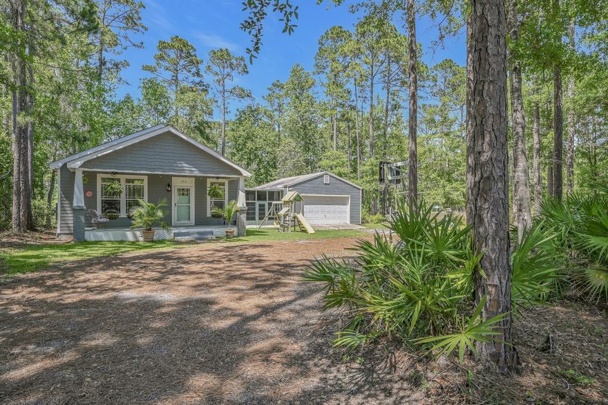 Attractive, remodeled home on .57 acres in quiet, wooded neighborhood with access to Choctawhatchee Bay. About 10 miles to beaches on 30A. No HOA. Relax and enjoy nature on your spacious old fashioned front porch. Entertain in your open floor plan and stylish kitchen equipped with granite countertops and stainless-steel appliances. The primary suite includes a spa-like bathroom with double vanity, marble walk-in shower, freestanding tub and walk-in closet. All 3 bedrooms have customized closets. There is an abundance of parking for boats, RVs, and vehicles, all accessed by a circular driveway. The 672 sq. ft. garage with 12 ft. ceiling is more than large enough for 2 cars plus a shop and a large amount of storage. A screened flex space connects the garage and house.