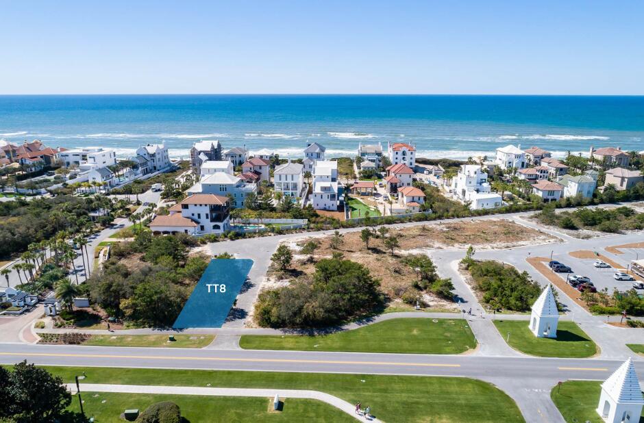 Welcome to TT8, the new custom homes site offering in the prestigious new urbanism town of Alys Beach. Nestled on the south side of scenic Highway 30A, this expansive property provides a captivating backdrop for your dream home. With endless design possibilities, TT8 offers a blank canvas to create a residence that reflects your unique style and preferences.Situated in close proximity to the private owners Beach Club, Zuma Fitness Center, and the vibrant retail aspects of the Alys Beach Town Center, homesite TT8 offers the perfect blend of convenience and exclusivity. Immerse yourself in the luxurious coastal lifestyle while enjoying easy access to world-class amenities.The Seller commissioned Pure Architecture, renowned for their impeccable designs, who is currently seeking approval for architectural plans that will be conveyed with the sale of homesite TT8. Pure Architecture has provided 2 schematic floor plan options. This spectacular schematic design is a 5361 sq. ft. home featuring 5 spacious bedrooms, 5 bathrooms, and 2 powder rooms. The highlight of this design is the generous courtyard & outdoor living room with swimming pool, seamlessly integrating the indoor and outdoor living spaces. The kitchen, dining, and living areas surround the pool courtyard, creating a harmonious and inviting atmosphere. The two-story layout includes a third-story roof terrace with an outdoor fire pit and a summer kitchen with a beverage center, perfect for entertaining and enjoying the stunning surroundings. The home design is also equipped with an elevator, providing easy access to all three levels. Designed with an abundance of windows, natural light floods every corner, creating a bright and airy ambiance. Pure Architecture will provide two floor plan options on behalf of the Seller. The Option 1 floor plan provides a 2nd Primary suite with a 2nd living area. The Option 2 floor plan provides a 2nd living room with a gaming room. Each scenario provides 5 total bedrooms.
Custom homesite TT8 is an exceptional opportunity for those with discerning taste. Here, you have the freedom to bring your design vision to life, ensuring that every detail of your dream home is crafted to perfection.
Indulge in the epitome of luxury living custom homesite TT8 offers in Alys Beach. Embrace the chance to create a home that reflects your personal style, surrounded by breathtaking natural beauty and unparalleled amenities. Don't miss out on this extraordinary opportunity to build your dream home in one of Florida's most coveted coastal communities. Contact us today to explore the endless possibilities that await you.