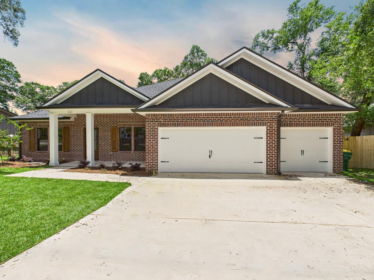 MOVE-IN READY!! The builder is covering 2% of the buyer's closing costs, plus doc stamps, title fees, and the final survey. A fence and refrigerator are also included, and buyers can choose from multiple blind options to customize their new home. Welcome to your dream home, where modern design meets everyday convenience! This stunning new construction features 5 spacious bedrooms, 3 bathrooms, and a generous 3-car garage. Thoughtfully designed with an open, split floor plan, this home offers both privacy and seamless connectivity, perfect for families and entertaining. The gourmet kitchen is a chef's delight, showcasing sleek quartz countertops, a stylish tile backsplash, a gas stove, soft-close cabinets, farmhouse sink and a walk-in pantry. The main living areas feature durable luxury vinyl plank flooring, blending elegance with easy maintenance. Step outside to enjoy the large fenced backyard, offering privacy and a safe space for outdoor activities or peaceful relaxation. Plus, the seller is including the fence, refrigerator, and blinds to make your move even easier. Centrally located in Niceville, this home is just minutes from local amenities. Enjoy quick access to shopping, dining, schools, and recreation, stunning beaches are just minutes from your doorstep.