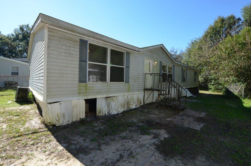 Located minutes from Interstate access, bases, and schools, this 4 bedroom 2 bath REO home is convenient and comes with tons of potential. Home has split bedroom design, large open kitchen with island, large dining area and oversized living room. Master bath has both tub and shower and lots of space in closets. Exterior yard is partially fenced. A must see to appreciate the opportunity and potential.