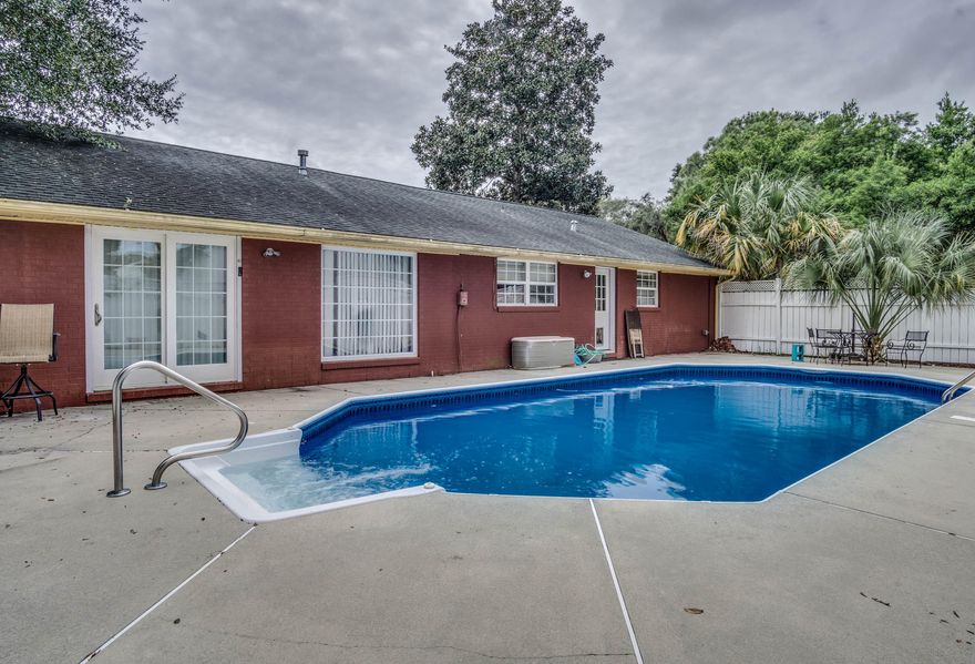 Large corner lot pool home in the heart of Fort Walton Beach. Close to bases, shopping and dining. This 4 bedroom/2 bath home has been a rental and is now looking for new ownership! The beautiful pool is in great working condition and carpet in the TWO living areas is newer. Washer and dryer convey (no warranty.) Master bedroom is ensuite and conveniently located need the exit to the pool. Home is partially furnished and some pieces can stay with the property if needed/wanted! Owner does have plans to keep some furniture and personal items. This is an as-is sale.