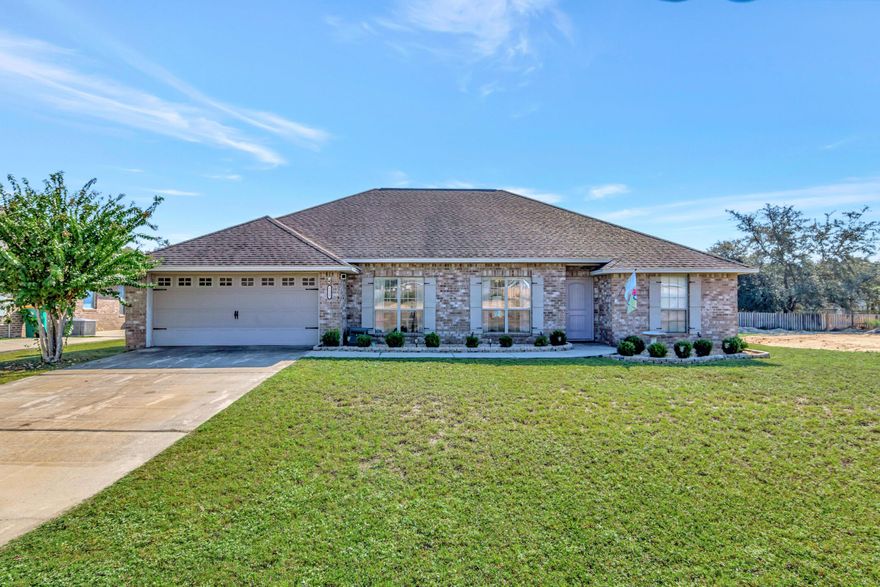 Is this your new home? Come take a look! This immaculate 4 bedroom, 2 bathroom traditional home is located in Lee Farms, and is conveniently close to everything that Crestview has to offer, including an easy commute to military bases (Duke Field, Eglin and Hurlburt), schools and shopping. This all-brick residence embraces a spacious floor plan (the Bessie) and features 2,067 of square footage, 9 foot ceilings, wood laminate flooring in the main living area, a sizable kitchen, breakfast area, and separate dining, just to name a few. Durable porcelain tile is found in the laundry room and bathrooms, while new carpeting is in the bedrooms. The kitchen is fully equipped with all new stainless-steel appliances, granite counter tops, tile back splash, raised panel cabinetry, under-mounted sink