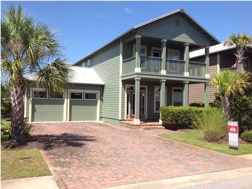 DON'T MISS THIS ONE!! This is a beautiful home in better than new condition with 9 ft. ceilings, a covered porch and a covered balcony. Incredible landscaping front and back yard with a lovely pond behind the home. Owners of this beautiful home have taken pride in ownership and have made improvements. Here are some of the upgrades and updates in this amazing Florida Cottage style home: Fresh paint on exterior in April 2013, interior freshly painted within last 6 months, fenced in back yard. Owners added first floor closet for storage. They also added trim and detail work on first floor and two rooms upstairs. Beautiful wainscoting going up the stairs, installed tile back splash in kitchen and 1/2 bathroom downstairs. The carpet and tile were professionally cleaned in May 2013.