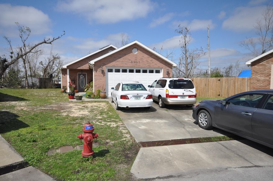 Beautiful all brick ranch . mins to Tyndall AFB. This home only lost a few shingles in Hurricane Michael and is a move in ready home. Close to everything...Shopping REstaurants.. the beach, Mexico Beach. Public boat ramp into the bay about a 2 miles away. Tenants have just moved out and the house has been just repainted and carpets cleaned. All bedrooms are great size. This would make a nice home for your family. Call now for your private viewing. Measurements are approximate. Please measure if important.