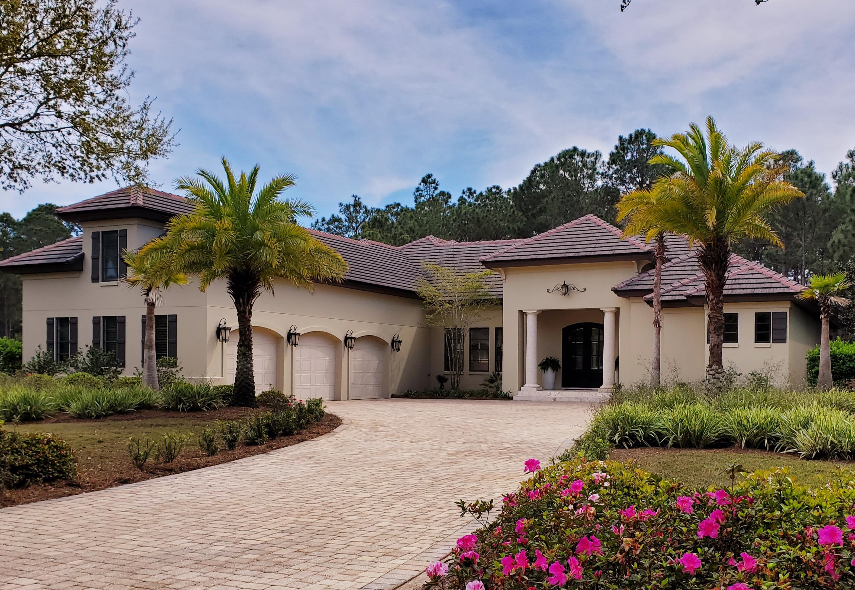 Under Contract with 72 Hour Kick Out Clause. Experience the light-filled elegance of this recently renovated 2010 Boswell Built home in the gated golf community of Burnt Pine offering 3844 sq. ft of heated/cooled space + 904 sq. ft. of Outdoor Living space on a .9 acre lot with 3 car garage, screened in heated, saltwater pool and lanai with fireplace, TV, summer kitchen, grill and icemaker. No expense was spared to create a buyer's dream kitchen with white cabinets, soft gray island with wine fridge, new quartz countertops and new Wolf double oven and gas stove top. The open floor plan allows easy flow for entertaining. The Living/Dining areas have an indoor/outdoor feel with a gas fireplace and a wall of windows overlooking the pool and private back yard which is wooded offering privac