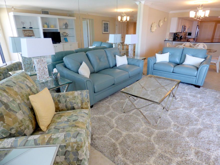 Breathtaking views from the balcony on the second floor. Inlet Reef has a parking garage under the building and extra covered parking under the tennis courts. This beachfront remodeled beauty has new contemporary furniture, a gorgeous open kitchen with great views of the gulf, granite countertops and all new GE stainless steel appliances. Unit has large tile and new carpteting in both bedrooms. Other features include electric shutters, a built-in entertainment center, smooth ceilings and crown molding throughout. Balcony opens to the master bedroom and living room area. Amenities include lighted tennis courts, gym,pool,sunning deck, Cabana and gas grills. Units at Inlet Reef rent well. Owner pets are allowed. Give me a call to show.