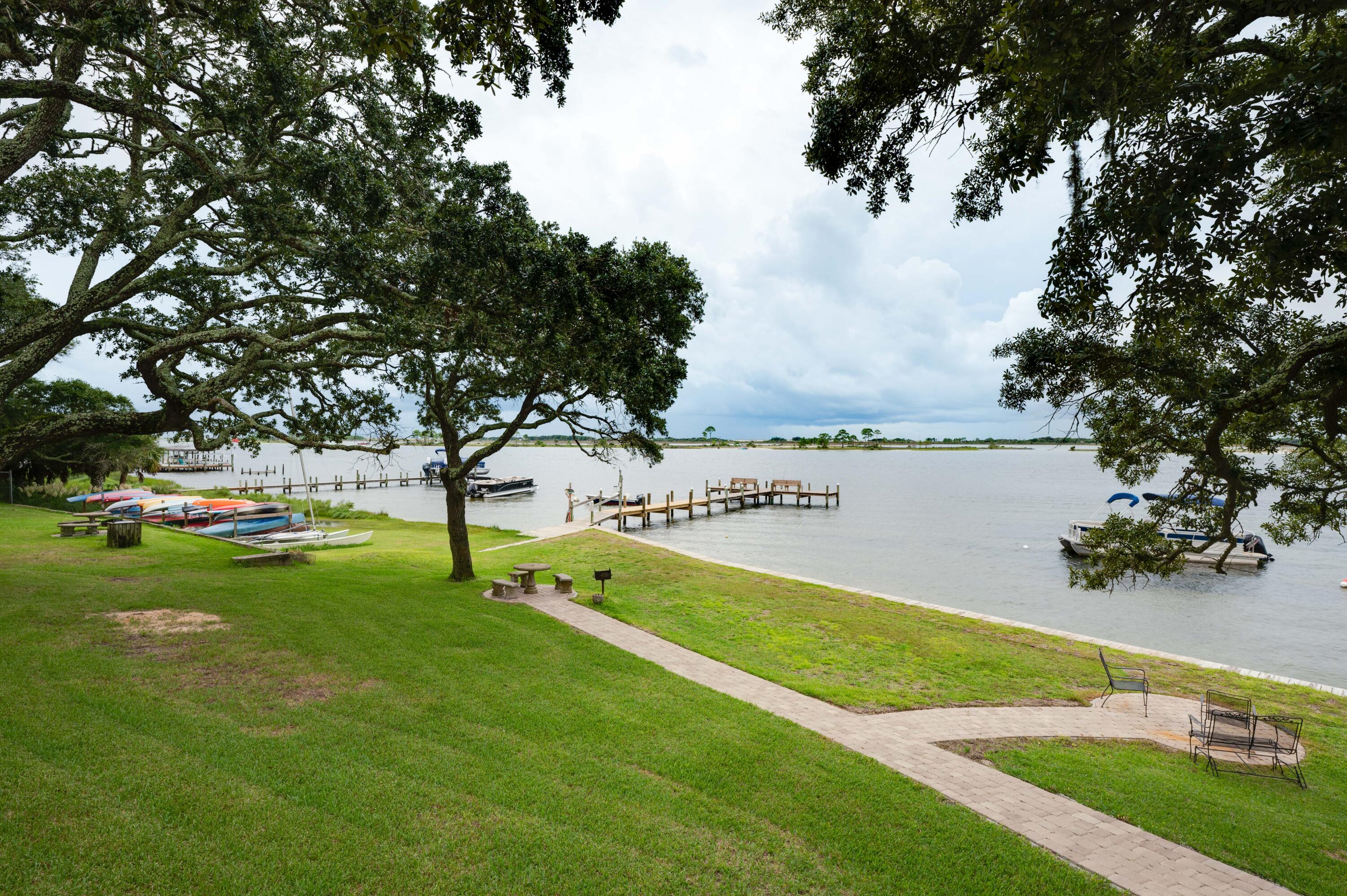 Waterfront complex with a pool and fishing dock!This beautiful 2 bedroom unit is fully furnished including kitchen amenities.This home has been tastfully decorated throughout.Conveniently located to the military bases,schools, dining and the beaches!