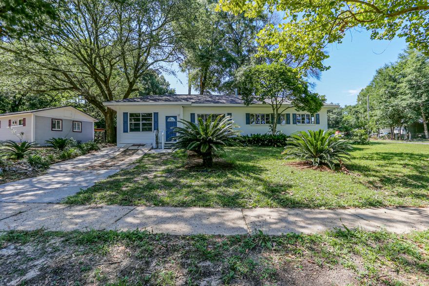 Beautiful corner lot filled with beautiful palms and fruit trees. Home was completely remodeled and boost NEW ROOF, NEW AC, NEW KITCHEN W/ QUARTZ COUNTERTOPS. Home includes LVP flooring throughout and NEW LED lighting and fixtures. Home ready for its new owner.