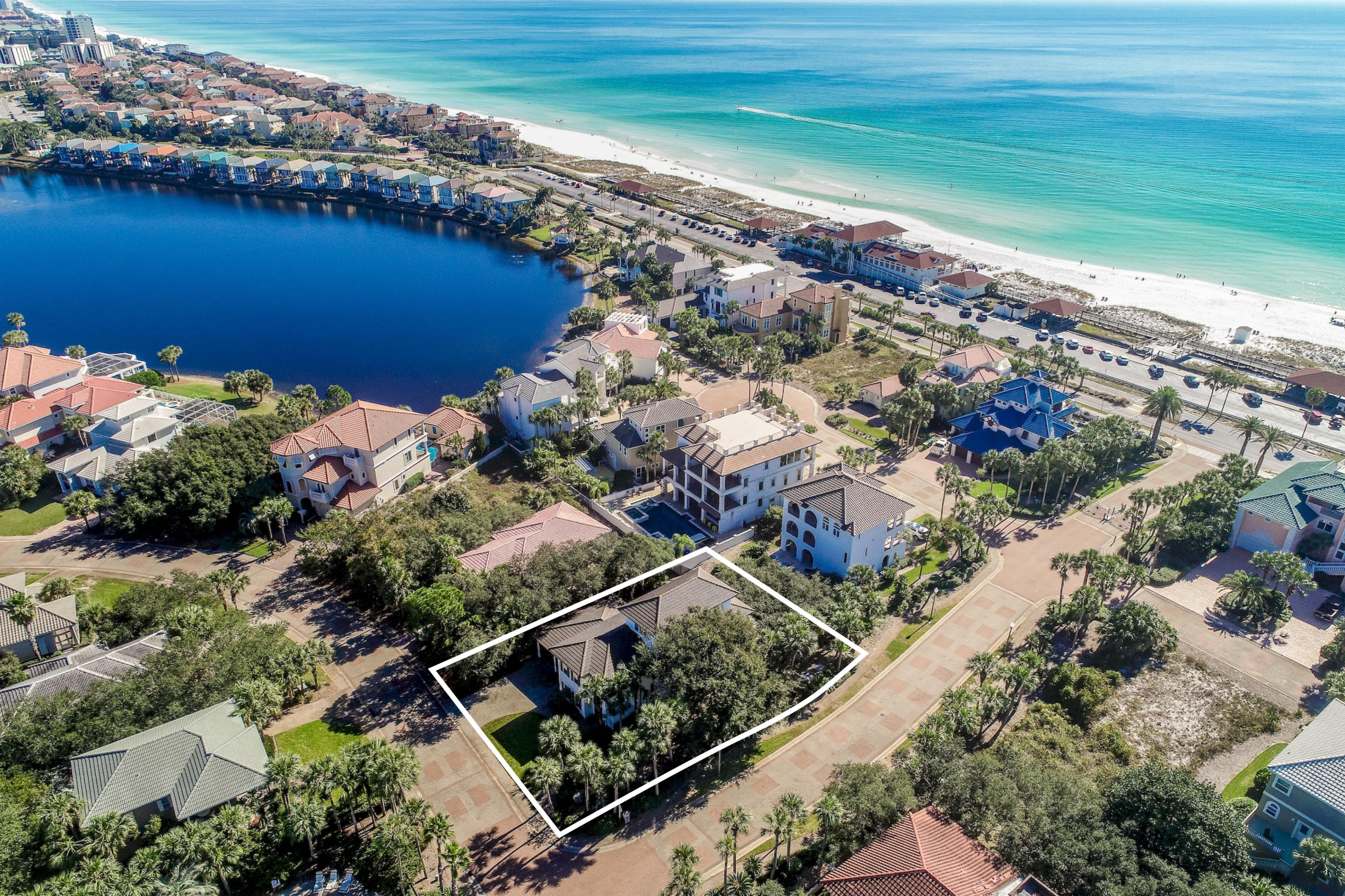 Modern elegance meets artful coastal contemporary design in this awe-inspiring beachside residence newly renovated and ideally located two tiers off the Gulf of Mexico on a massive corner lot in the gated community of Destiny. This pristine coastal retreat has been professionally designed, furnished & curated to evoke a welcoming aesthetic and has been masterfully configured featuring 6 bedrooms (including a pinterest-worthy oversized bunk room), 6 full ensuite bathrooms and a large open floor plan with clean lines and pristine gulf vistas. This property is the perfect arrangement for a primary, secondary or rental focused property and has been well maintained as a second home.