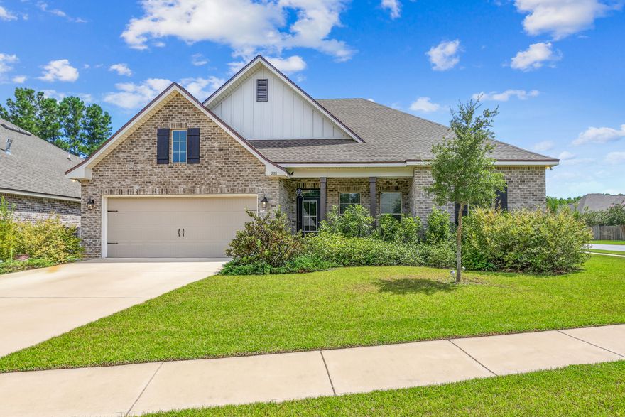 Welcome to 258 Blaze Boulevard, located in the highly desirable Trails at Hammock Bay community in Freeport, Florida. This beautifully crafted Comstock III H floor plan offers 4 bedrooms, 2 full bathrooms, and 2,314 square feet of heated and cooled living space, all on one level. Built in 2022, the home is situated on a 0.24-acre corner lot and showcases a timeless traditional design enhanced by modern upgrades and energy-efficient features. The spacious interior boasts an open-concept layout with a 20' x 21' living room, a well-appointed kitchen featuring a center island, walk-in pantry, gas range, and undermount sink. The primary suite includes a garden tub, separate custom-tiled shower, double vanity, and a generous walk-in closet. Three additional bedrooms offer ample space for guests or family, and a boot bench in the mudroom adds functionality and style. Additional highlights include a tankless gas water heater, recessed lighting, bronze plumbing fixtures, Low-E vinyl windows, a covered front porch and back patio, architectural 30-year shingles, and a 21' x 21' attached two-car garage.