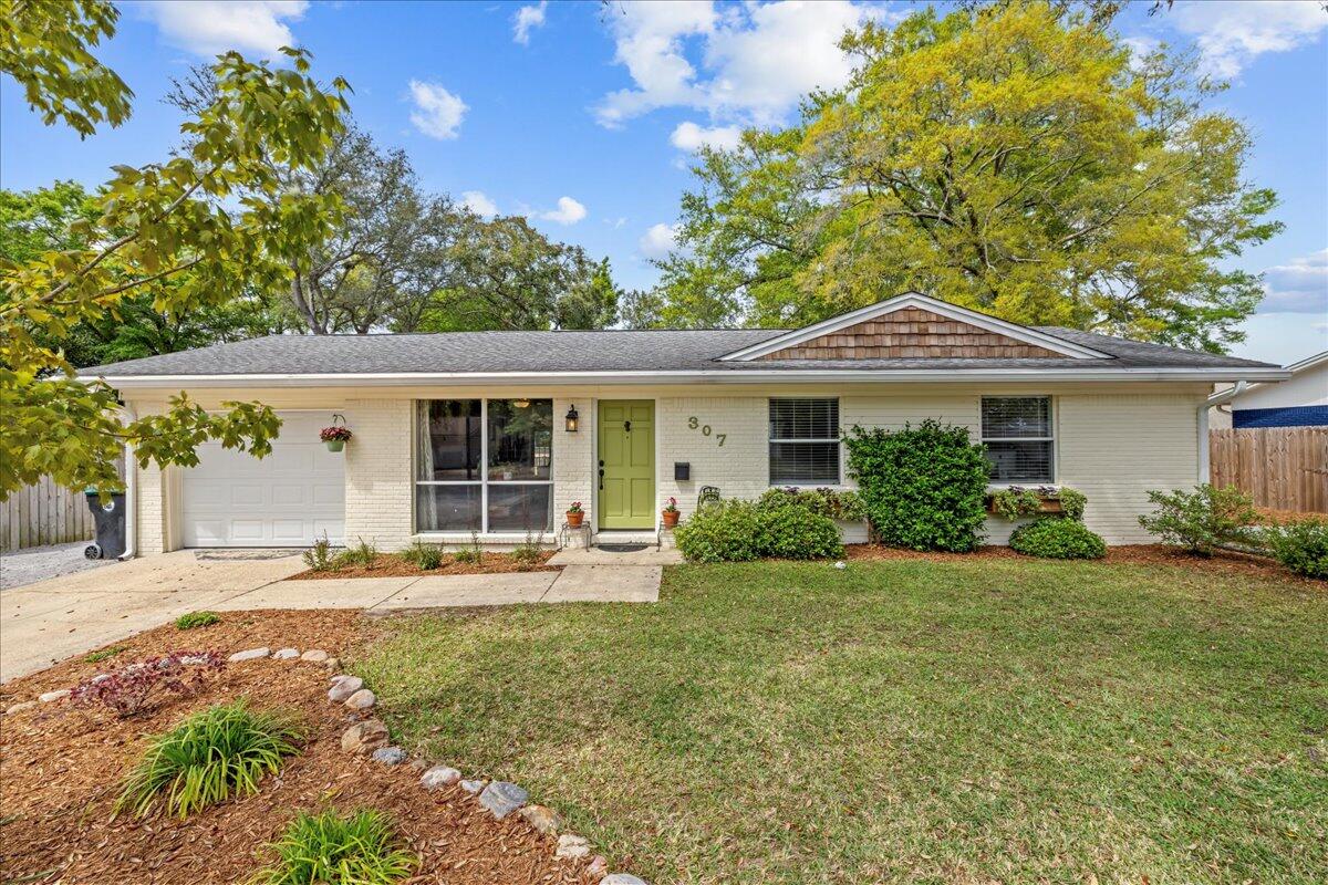 LOCATION LOCATION LOCATION!!! Right in the heart of Niceville, close to the high school and about 20 min to Destin! This recently remodeled home features 4 bedrooms, 2 full bath, a gorgeous open concept and beautiful kitchen with the works- stainless steel appliances, granite and oversized counter top, and newly added custom brick back splash! Custom finishes in newly renovated bathrooms as well! You'll love entertaining in this home- lots of space and natural light as you enter the home. Brick fireplace with custom built in bookshelves Once you step out back, there's a nice deck, patio and a large storage shed for added storage and/or man cave! ROOF: 2014 HVAC: 2010, WATER HEATER 2020