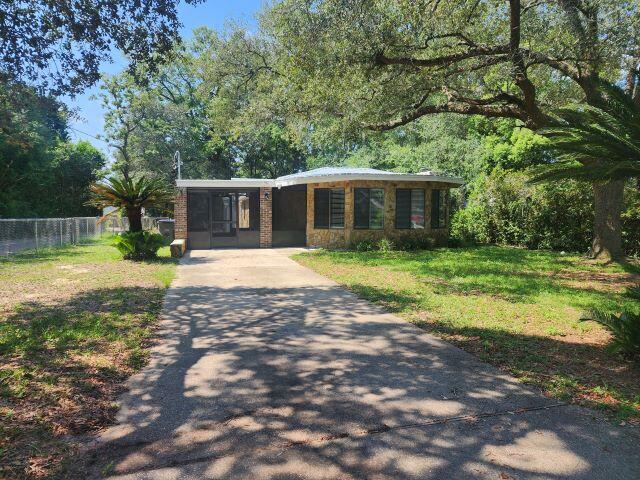 AVAILABLE 10/072024 - Adorable Florida cottage just minutes from Eglin AFB. Stone exterior with an open floorplan. Large living area with large picture windows to pipe in the natural light. Tile floors, breakfast bar, large bathroom with stand up tile shower and separate bath with a jacuzzi tub. Nice lot with mature native landscaping and a large workshop in the back! Don't miss it! One small dog 30 lbs or less with owner approval and nonrefundable pet fee. NO VAPING, NO SMOKING. FIREPLACE IS NOT OPERATIONAL, FOR LOOKS ONLY. Applicants to verify items of importance including room sizes and school zones