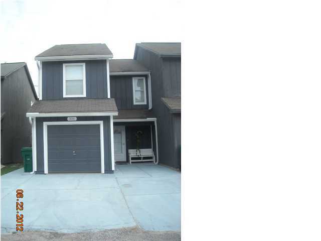 This two bedroom townhome is conveniently located near schools, shopping, yet centrally located between both bases. Interior features all new appliances including the washer and dryer. Downstairs has a breakfast bar, wood burning fireplace, tiled kitchen, hallway, and baths. Upstairs is carpeted through out. Exterior offers an open patio for your enjoyment. No smoking. Small pet with owner approval less then 25 lbs. Call for your showing today.