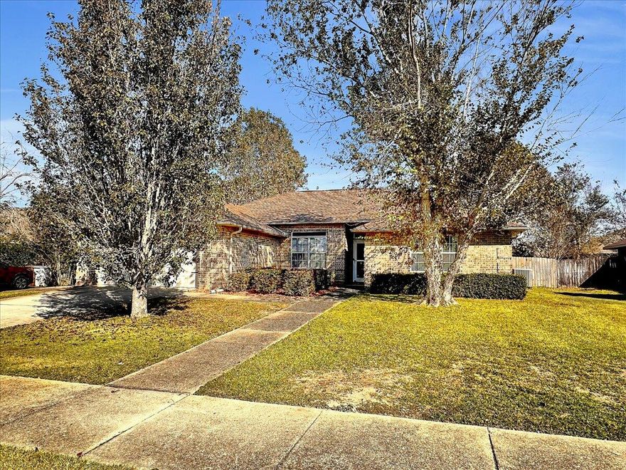 Assumable mortgage at 3.25%!!! New roof in 2022, New HVAC in 2018, New water heater in 2020. Termite bond in place. No flood insurance required!Experience the epitome of Florida living in this exquisite and meticulously maintained 4 bedroom, 2 bathroom residence tucked away on a quiet cul-de-sac street. As you step inside, you'll be embraced by the flood of natural light which showcases the home's expansive high vaulted ceilings and open, split-bedroom floor plan. At the heart of the home, a cozy wood-burning fireplace invites you to relax. From here, French doors lead you to a large screened-in porch, complete with a ceiling fan and wired provisions for a hot tub.