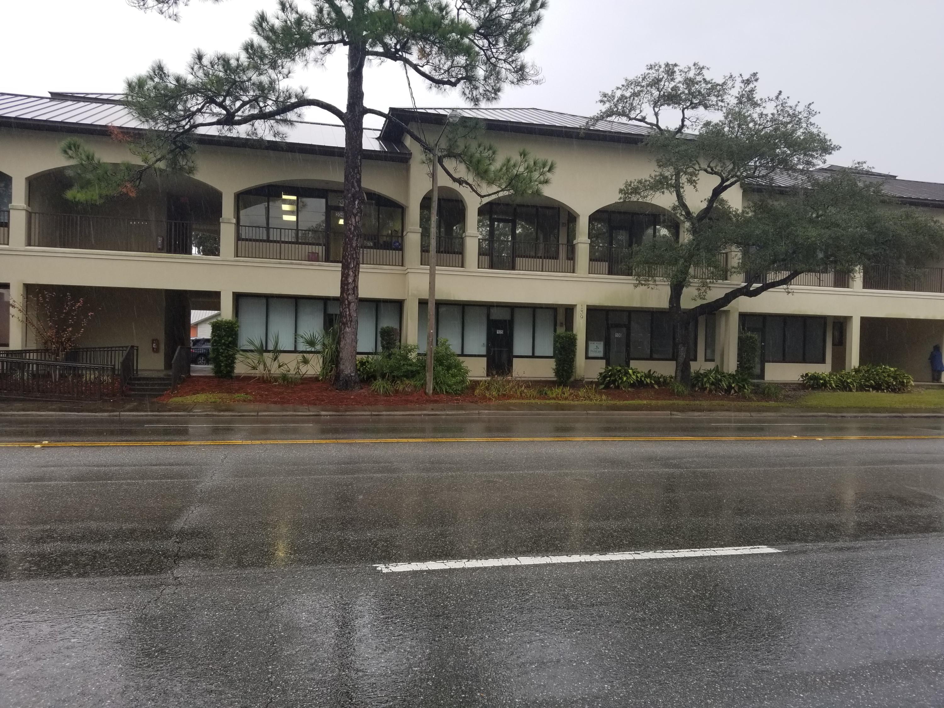 Location location location and Owner financing available.This approximately 800sf unit has high visablity to heavily traveled artery of Fort Walton Beach. The Professional stance of this building draws attention with beautiful land scaping. An abundance of parking flanks the north and east of the structure. Rear delivery access adds to the convenience. A full wall of windows welcomes all at entrance to your thriving business. For additional space unit 105 is being sold separately. Office or Retail space.