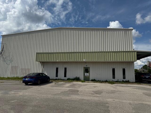 Prime Warehouse Space - 10,000 Sq Ft - Fort Walton Beach This spacious 10,000 sq ft commercial property is perfectly situated on a high-traffic street in the heart of Fort Walton Beach, offering excellent visibility and. with large parking lot space available, 3 12x14 garage bays, Ground level 14' roll up doors & a office space with bathroom inside.