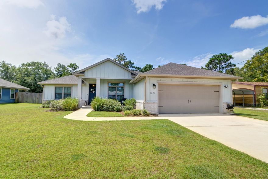 Welcome Home ~Only a few years old and still like new this luxurious 4 bed/2 bath floor plan offers a Great Central Location close to Local Stores and easy access to Navarre Beach,Navarre Waterfront Park and Hwy 98 to Hurlburt Field AFB.This Stunning Home offers trend setting Features~Greeted by a walk in foyer sweeping through to your open floor plan~Large kitchen enjoying rich espresso cabinets with crown molding, beautiful GRANITE counter tops~Under mount sink~S/S appliances ~extended Island with sit up Breakfast bar & open flow to the dining area and large family room, Wood laminate through the foyer & main living area with tiled laundry and bathrooms.Large Master with trey ceiling & ceiling fan~Master bath offers an oversized TILED shower ~ Granite his & hers vanities with undermount rectangular sinks ~Two walk in closets ~antique bronze fittings with picture frame mirrors.Two additional Bedrooms are a great size with double closets and ceiling fans and the third additional bedroom with closet could be used as an office/study.~Home has a welcoming covered front porch and large covered back porch to sit out and enjoy those wonderful Florida evening ,great to cook out and entertain. Large lot ( 200 ft deep )with wooded buffer for privacy & fenced grassed yard with a gate through to the wooded buffer.Sprinkler system~ lawn pump and well with digital programmable timer for easy care.Oversized garage ( approx 24ft deep )for larger vehicles and still room for all the beach toys.TAEXX in wall pest control system~ Hurricane protection boards and dimensional shingle roof for lower insurance premium. Upgrades throughout include bullnose corners ,knockdown ceilings, recessed lighting , deluxe lighting package,50 Gallon water heater, garage door remotes, attic drop down stairs~ to name a few.....Call today for further information.