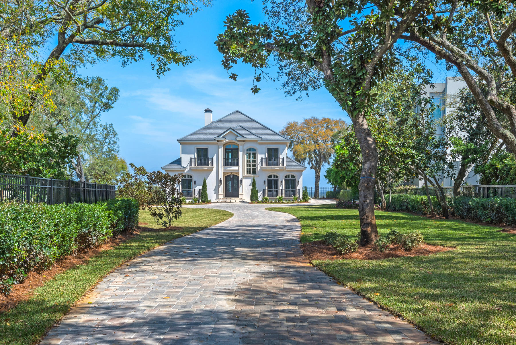 This beautiful NEW CONSTRUCTION home is located in the exclusive area of Cobb's Point. The bay front views are visible from almost every room in the house. This 4 Br/ 3.5 Ba house is located on a large lot, with a pool and spa. All of the cabinets and wood work are custom made and were built on site. It has a Daikin VRV units, a multi-split AC system. The home also has large tankless water heaters, which provides continuous loop of recirculating water. The windows installed are Low E Missile impact windows too. It also has a new dock which can accommodate a boat and wave runner lift. This house is a must see!