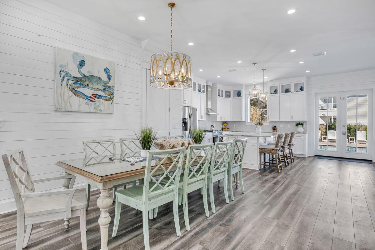 Pristine new construction prominently situated in Destin's Crystal Beach corridor yielding exceptional short term rental potential with over $120,000 in gross revenue already booked for 2021 and a target of $200,000 in total projected annual income. Masterfully designed and beautifully furnished, this impressive 8 bedroom, 7.5 bath retreat yields resort style amenities including a private elevator and exemplary private resort style pool. Notable features include an open floor plan with first floor primary living including a large chef's kitchen finely outfitted with stainless appliances as well as ample custom cabinetry adjacent to a large living & dining area that effortlessly flows to the outdoor resort amenities.