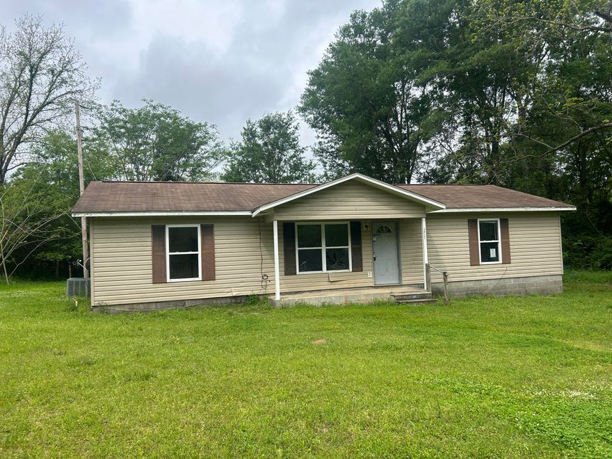 This home built in 2007 could be your next flip or your next home.  Home has good bones but needs some TLC.  Interior work includes floor covering, sheetrock repair/replacement, interior doors and sheetrock repair. Fronts paved street. The slower paced living of Noma makes it a pleasant get away from the hustle and bustle of city traffic.  Bonifay is 15 miles, Graceville is 7 miles., Slocomb, AL, is 10 miles. This price for a 17 year old home on .41 acre is hard to beat. With some elbow grease and time, make it your Home Sweet Home!