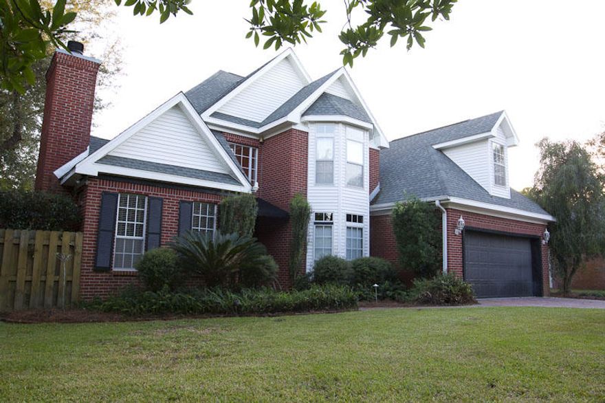 Prime waterfront property located in the heart of Destin. Located on the second closest protected deep water inlet from the Gulf. 40 Foot dock with covered boat lift that has water and power. Home features wood floors, custom built in fire place, wet bar and book shelves, travitine master bath floor and walls. Glass enclosed large shower and bath with exquisite lighting. House has large cronw molding throughout high ceilings. This is an easy show. In ground pool with very large paved deck with waterfall feature. Cool off under the the live roof deck in the backyard. Termite Bond, security system and well irrigation. Listing Broker has ownership interest in property.