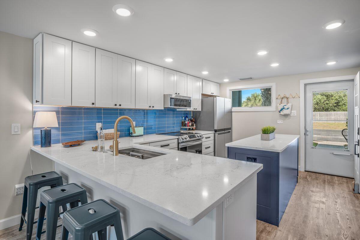 SUNNYSIDE BEACH & TENNIS CONDO - Residential