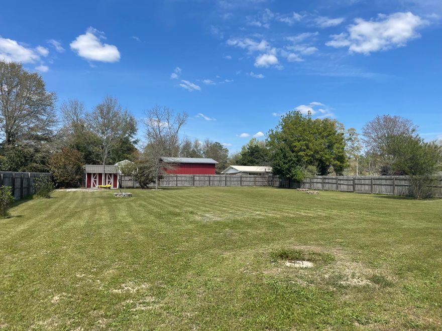 Rare Opportunity in Kyndall Ridge Estates!Welcome to this beautifully crafted all-brick custom residence located in Kyndall Ridge Estates--with no HOA restrictions. Situated on over half an acre, this expansive property offers ample space to add a pool, create an outdoor oasis, or enjoy wide-open backyard living. Step inside to soaring ceilings accented by architectural art niches and a striking fireplace that anchors the main living area. The home features luxurious Brazilian hardwood flooring, complemented by tile in all wet areas and plush carpet in the bedrooms for comfort and warmth. This spacious and thoughtfully designed home offers 4 generously sized bedrooms, 3 full bathrooms, and a versatile bonus room perfect