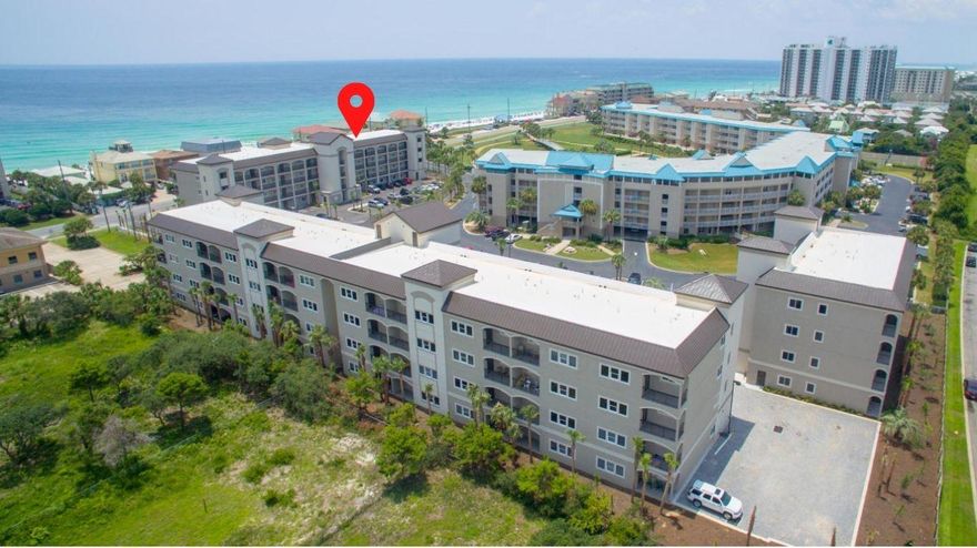 It's Alerio! IMMACULATE & Never RENTED. Literally steps from the beach. Stroll across the street to the beach via one of the two deeded beach accesses (1 private), or hop in your golf cart for a short ride to shopping, dining and entertainment on Scenic 98 (a.k.a. Old 98).This 4th-floor, 3-bedroom condo offers wood floors throughout with tile in baths; 10-foot ceilings; crown molding in living area; granite countertops in kitchen & baths; stainless steel appliances; washer and dryer. A gated community, with a fabulous heated pool, hot tub, splash pad for kids and outdoor grilling area.