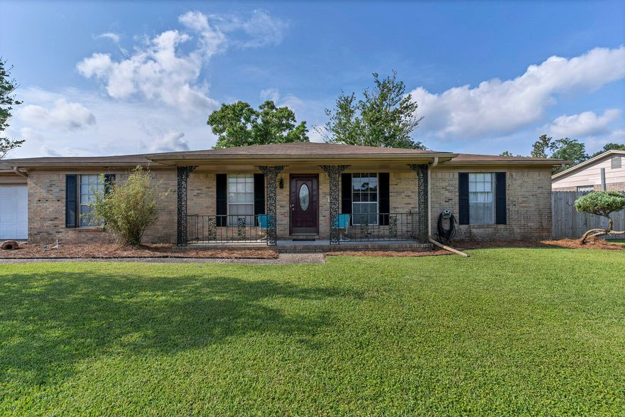 Enjoy lakeside living at it's best! Don't pass on this rare opportunity to live facing a beautifully maintained lake, where wildlife of all types can be enjoyed from your front porch. Eagles, ospreys, herons, and the community ducks and ducklings call this lake home. The large back yard is completely fenced making it great for both kids and pets. Beach life is less than 30 minutes away. With Pensacola Beach to the east, and Perdido Key to the west, you'll enjoy all the glory Pensacola's snow white beaches have to offer. The open style rooms of this brick ranch-style home allow for comfortable living and entertaining. Upon entry, you'll encounter the living and dining area which combine for an open and airy atmosphere. Then on to the large kitchen, with ample counter and cabinet space, and