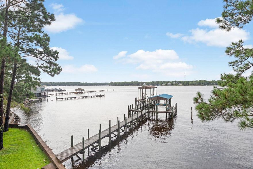 Introducing a captivating waterfront retreat in the heart of historic Niceville, FL! This charming home, located on the water, offers 3 beds and 3 baths, along with a highly convenient location by bases, schools, and shopping.Step into a world of character and charm as you enter this well-loved home. With a cozy atmosphere, the spacious rooms provide ample space for comfortable living and privacy. Imagine curling up with a good book in the inviting living area or enjoying meals with family amid a waterfront backdrop in the dining room.The waterfront setting creates a picturesque backdrop for everyday living. Wake up to breathtaking views of the water and take advantage of the outdoor space, perfect for enjoying the soothing sounds and gentle breezes. Whether it's morning coffee