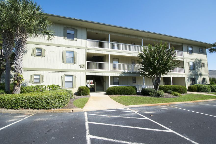 This is a great opportunity to own a ground floor 3 Bedroom, 2 Bath condo. Beachwood Villas are conveniently located within walking distance to several restaurants and shops. In the Beachwood Villa community, this Villa is located in building #10. This condo has a tiled patio with chairs and a table. The open living, kitchen and dining areas are complimented with a table and 4 chairs. There is a sofa and love seat in the living room with a flat screen TV. The home theater system and stacked washer/dryer is a bonus among these condos! Two of the bedrooms have a Queen bed and one has 2 Full beds. The master bedroom enjoys a private bathroom while the 2 guest bedrooms share a full bathroom. Beachwood Villas offer 2 community pools, tennis courts, shuffle board and a children's play area.