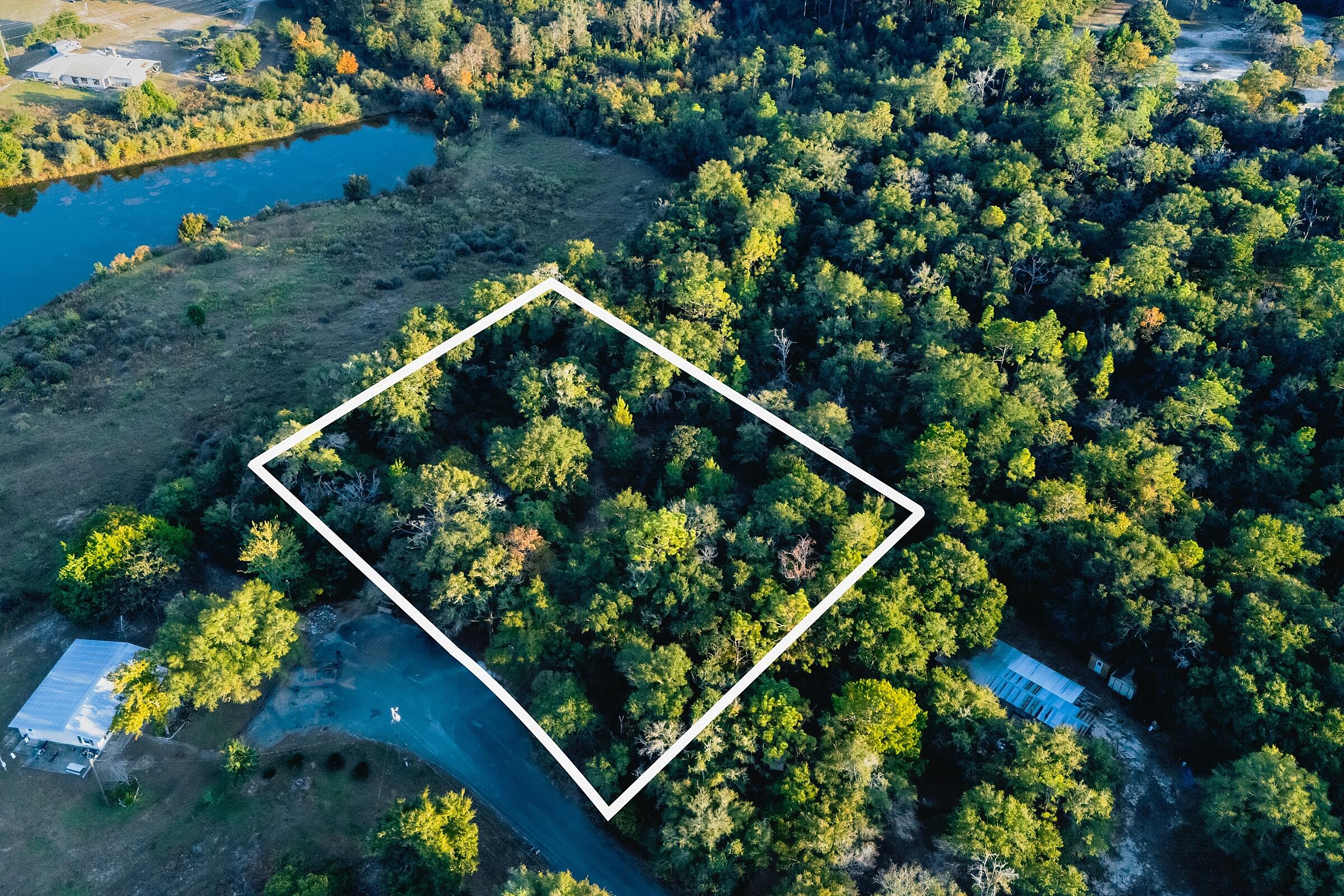 This beautiful 1.3-acre parcel is the perfect opportunity for your next home or investment! Get the best of both worlds with quiet country living on a cul-de-sac, close to all of the convenience of town. Located only 7 minutes from the charming downtown of DeFuniak Springs. Previously home to a mobile unit (now removed), the property still has a power pole in place, making setup convenient. In 2014, the current owner added a cozy 1-bedroom 12ft x 28ft shed with 2 lofts, offering great potential for a variety of uses. With its scenic landscape and peaceful surroundings, this is a rare find at an amazing price! Don't miss the chance to own this exceptional piece of land. Water well and septic as is condition.