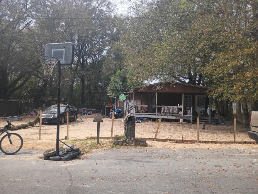 3-bedroom, 1-bath single-story home with a sitting room offering 888 sq ft of living space. Features wood flooring, a small front porch, and partial fencing with chain link in the backyard. Kitchen was updated about 4 years ago with new cabinets, marble countertops, and black appliances. Bathroom is original.The sale also includes the adjacent lot with a separate APN, offering additional space and future potential. Great opportunity for investors or buyers looking to add value!