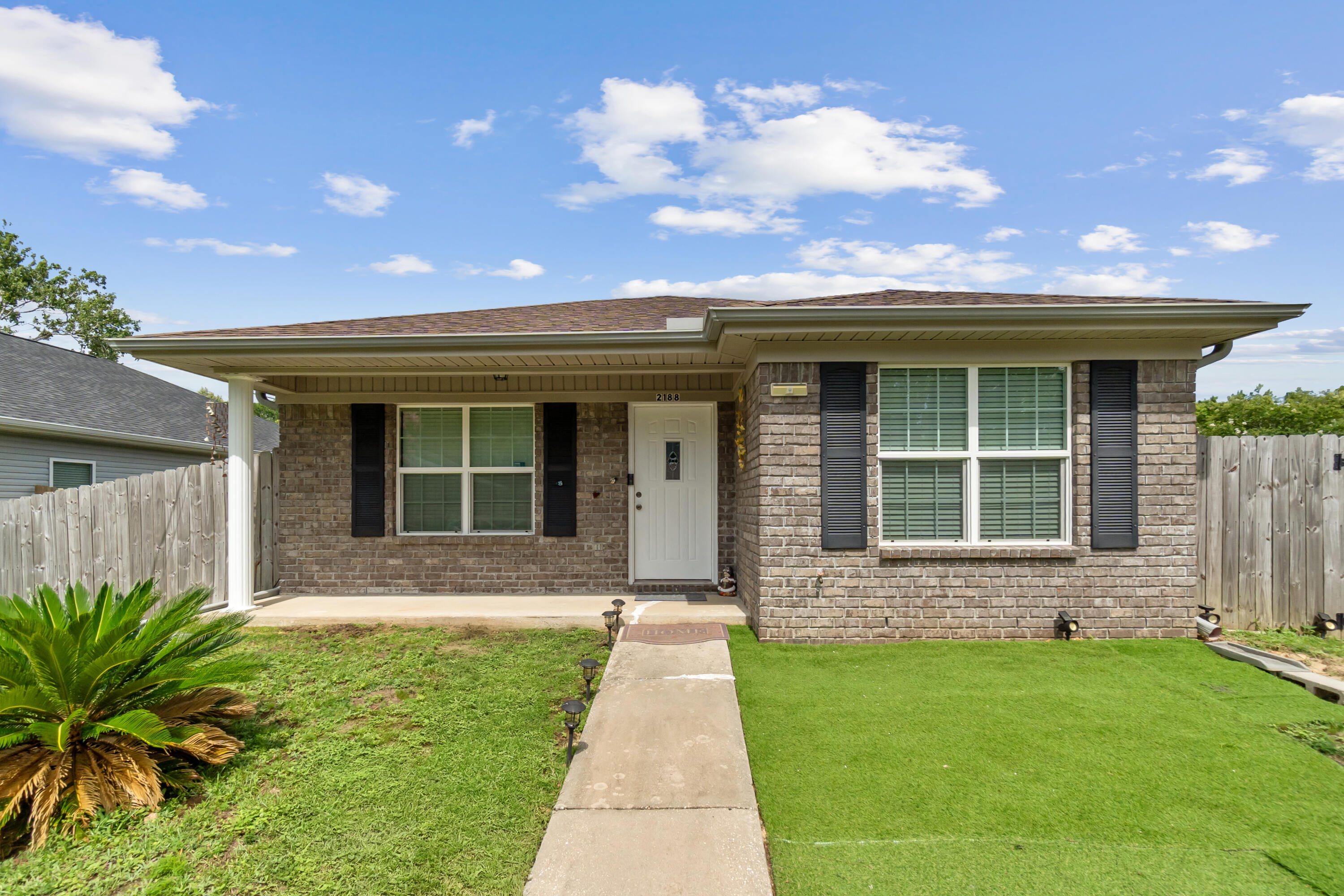 Welcome to this charming 3-bedroom, 2-bathroom home in Navarre, ideal for first-time homebuyers or investors seeking a strong rental opportunity. This well-maintained residence features an open kitchen and dining area, complete with an oversized pantry for ample storage. Built in 2016, the home includes energy-efficient solar panels to help lower utility costs. The spacious backyard offers room for pets, play, or outdoor entertaining. Located just minutes from the white sands of Navarre Beach, shopping, dining, and military bases, this property combines comfort, convenience, and value.