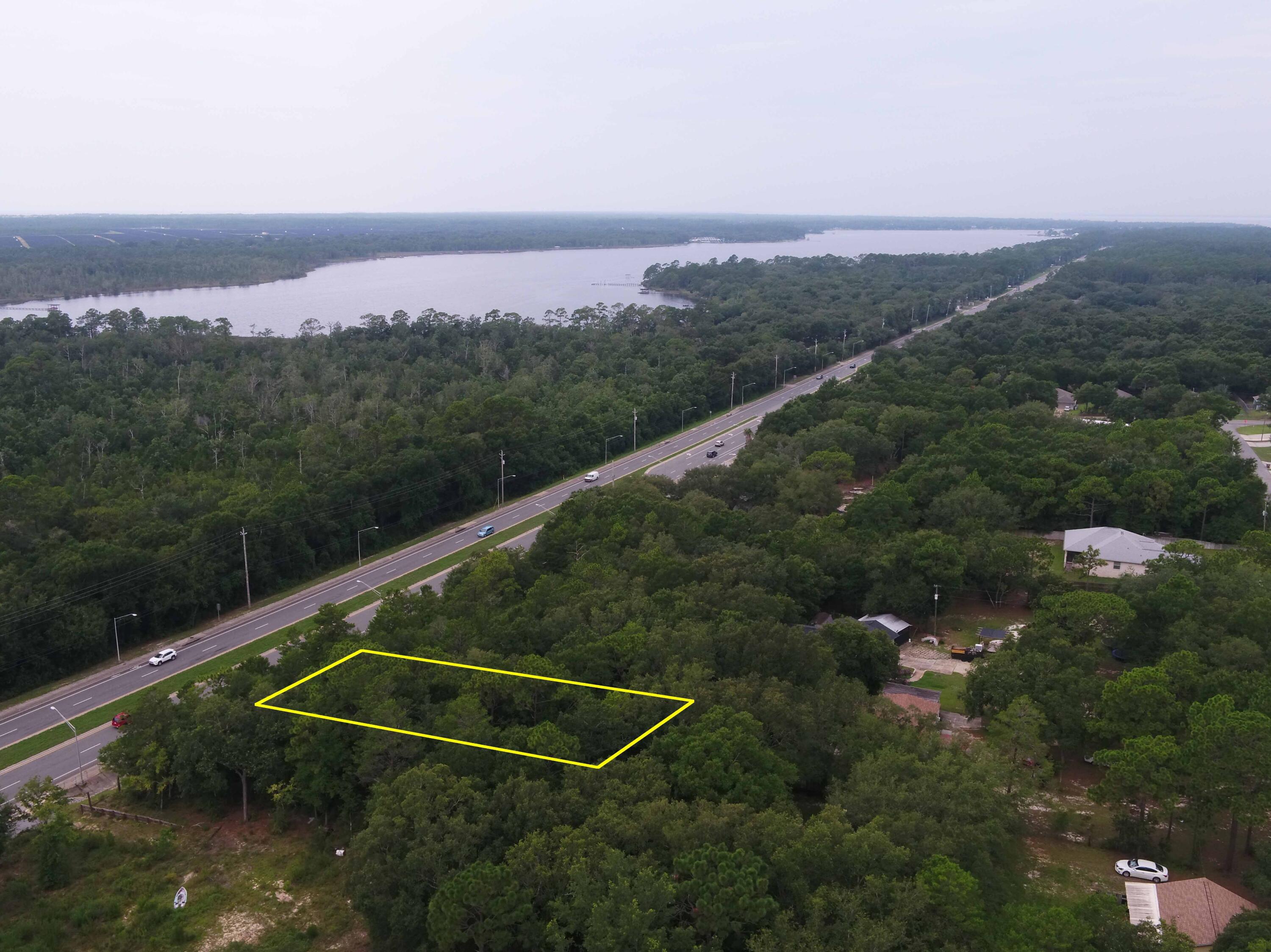 Prime 0.4-acre commercial lot on State Road 87 in Navarre! A hundred feet of frontage along a major four lane highway, not far north of the East Bay River Bridge. Power and water on the road. Zoning is Highway Commercial Development (HCD) which allows for a wide range of uses. Buyer should consult Santa Rosa County land development code for more details. Address is only for navigation purposes and is not a legal situs.