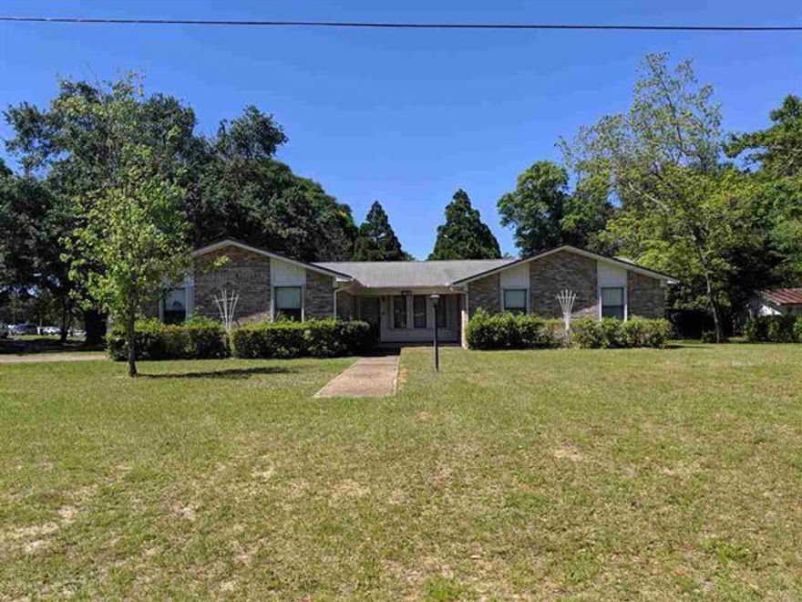 This incredible 3 bedroom/2.5 bath home is situated on a gorgeous, corner lot spanning just over a half acre. This well built brick home features three sizable bedrooms, formal dining area, separate breakfast nook and a conveniently located half bath just off the garage and laundry room. The well maintained workshop out back makes for the perfect handyman's garage with electric and water available. Extra features include home security system, invisible fence, gas fireplace and irrigation system.