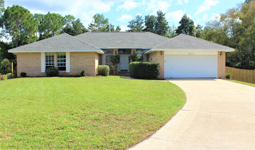 ''Spacious 4 bedroom/2 bath + office, one-story brick home on a cul-de-sac, with mature trees and shrubs on .48 acre. Sprinkler system. Conveniently located south of I-10 with access to the most southern road on Hwy85 for an easy drive to bases (Duke Field and Eglin AFB) or town! Built in 1996, this home has a new air conditioner (2018) and new roof (2019). Two-car garage, gas water heater, gas or electric for dryer, gas range and oven, gas furnace (new). Tile flooring in bathrooms, kitchen, hallway, and laundry room. No HOA fees.'' All measurements are estimates and buyer should verify that which they deem important. Sold AS IS