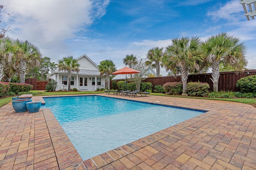MAJOR  price improvement! This is a rare setup for 30A and priced to sell!! Welcome to 85 N Deno, a truly exceptional one-story carriage house home nestled in the heart of Santa Rosa Beach, Florida. Situated in an exclusive non-rental community, this residence offers the perfect blend of coastal living and tranquility.Carriage house residences on Deno Drive are a rare find, seldom available on the market, and often transacted off market.  Explore 30A and discover a unique opportunity - a sprawling 4,200+ square foot residence complemented by a standalone one-story carriage house featuring a garage, all set amidst a generous backyard with a pristine pool.
